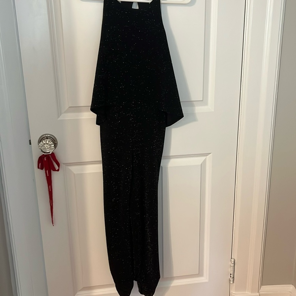 Aqua brand sparkly black halter neck jumpsuit.   Size XS